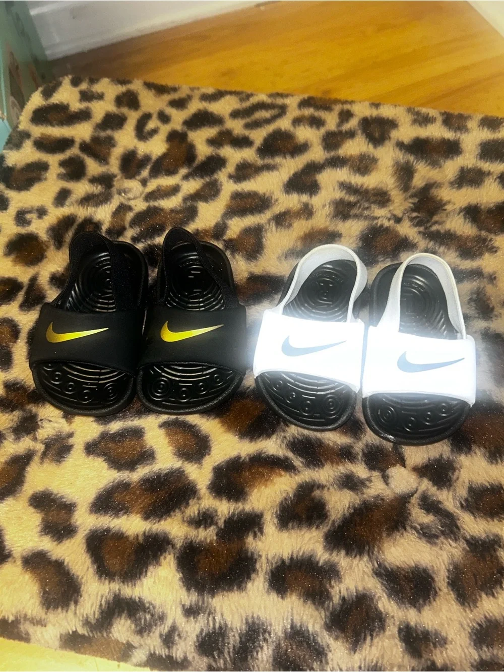 Baby Nike Slide Sandals in Black with Yellow Swoosh & White with Blue Swoosh
